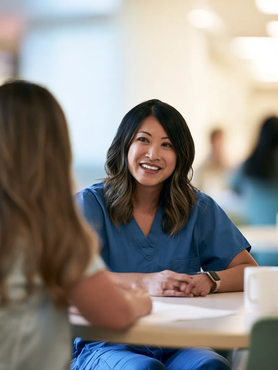 Nurse consulting on medical billing before a medical loan decision